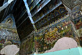 Paintings on the wall of the outer cloister of the Mahamuni Paya, Mandalay, Myanmar 